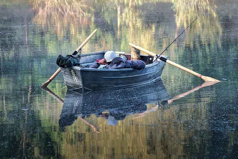 Man Relaxing in Boat